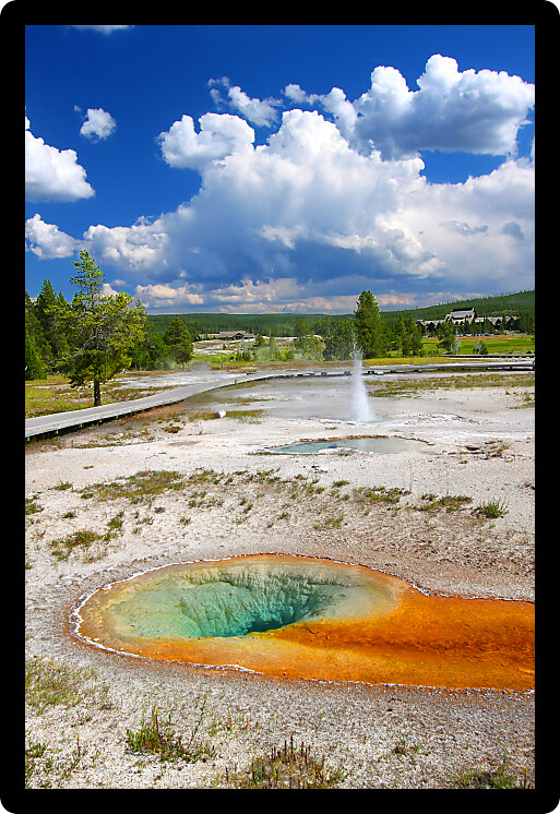 Beautiful landscape of Yellowstone National Park Upper Geyser Basin with Belgian Pool seen in the foreground.