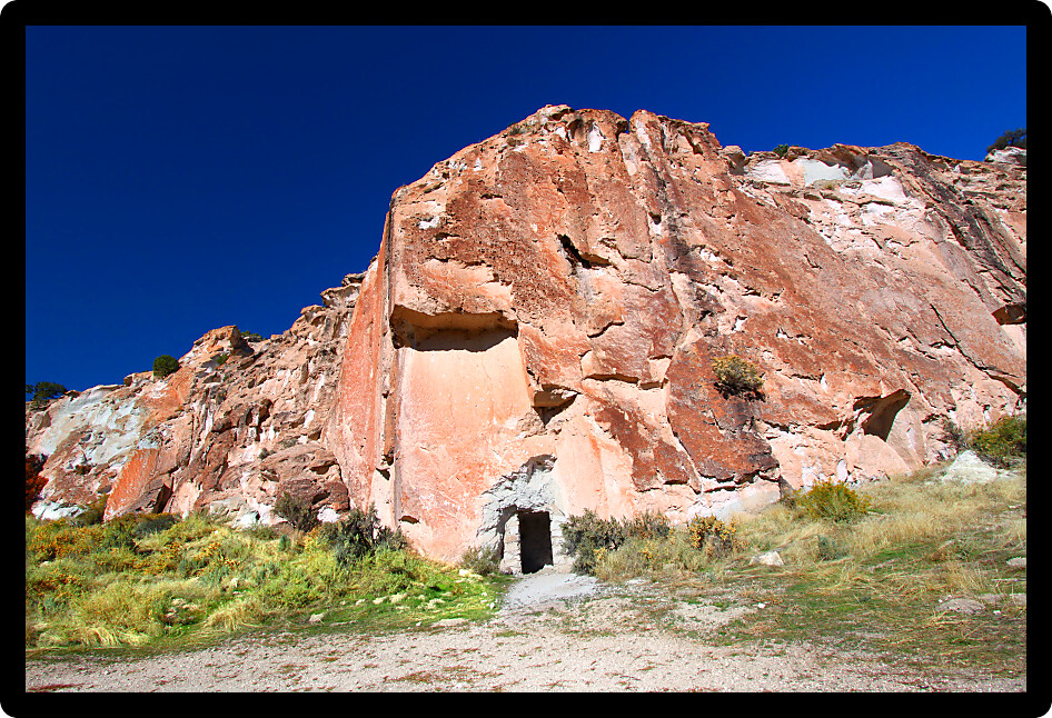 Carved out opening in a rock wall in the Fishlake National Forest of Utah.