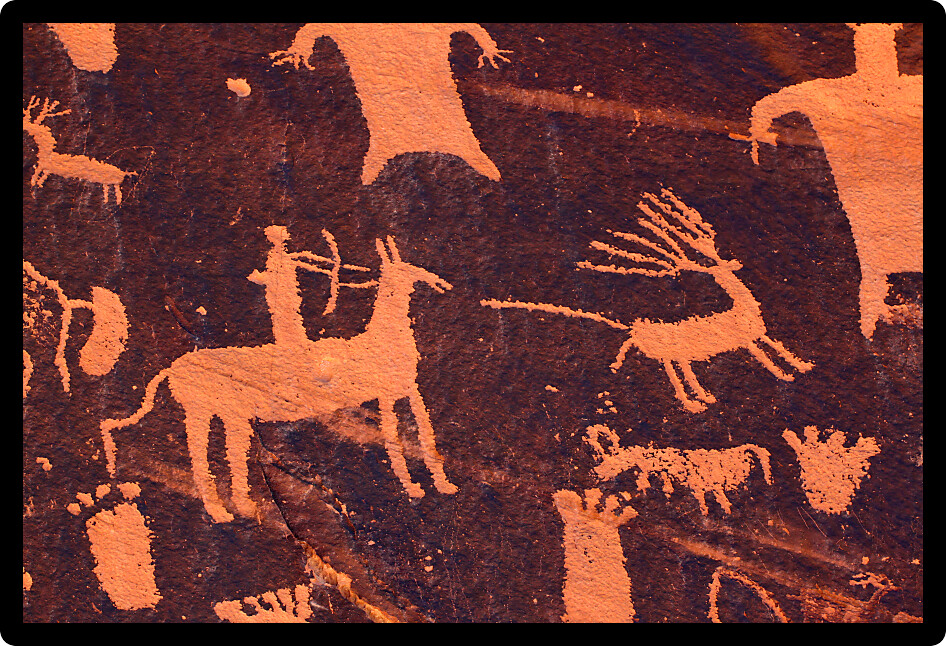 Petroglyph on Newspaper Rock in Utah depicting hunting on horseback.