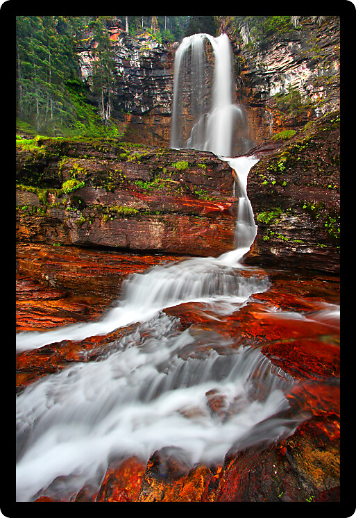 Beautiful Virginia Falls in the forests of Glacier National Park in northern Montana.