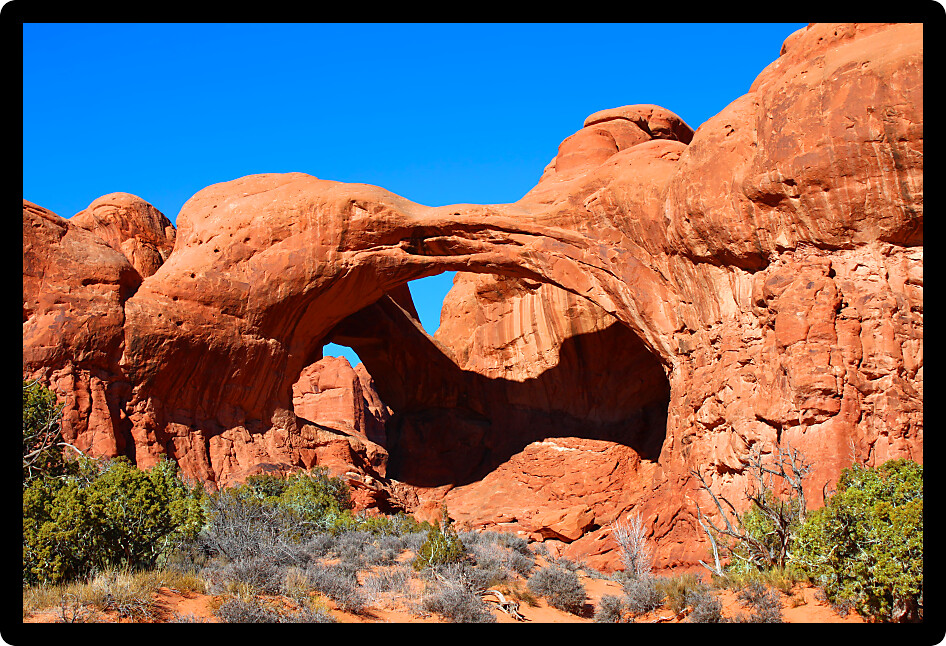 Double Arch spans the valley floor of Arches National Park in Utah.