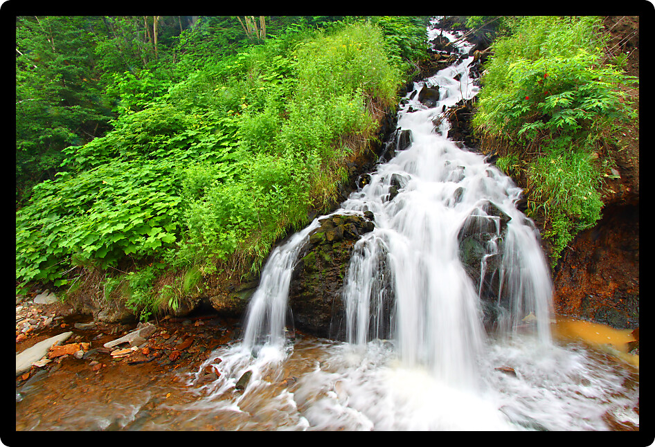 Beautiful cascading waterfall in the Black Hills National Forest of South Dakota.