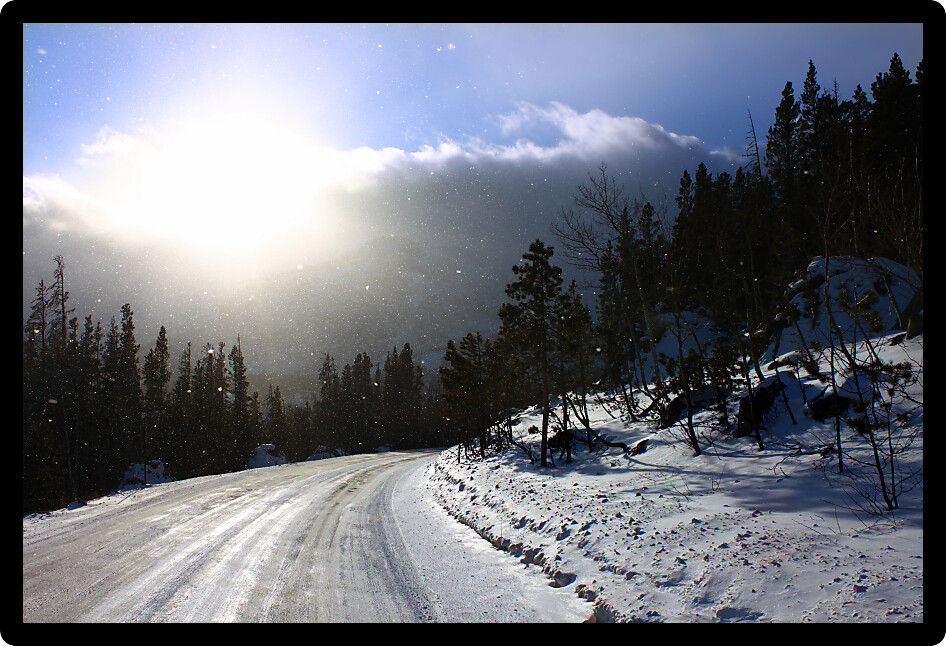 Snowstorm scene on a road through the Colorado Rockies. 