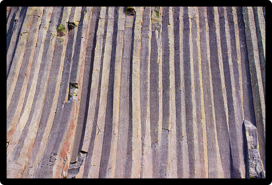 Zoomed in shot of Devils Tower National Monument showing interesting geological features.