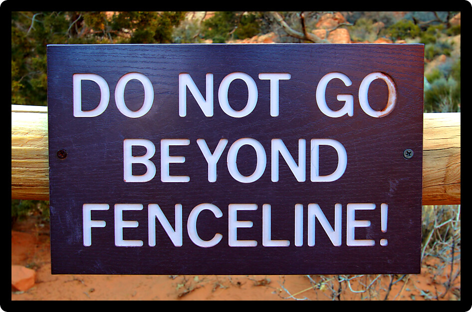 Sign reading Do Not Go Beyond Fenceline in a United States national park.