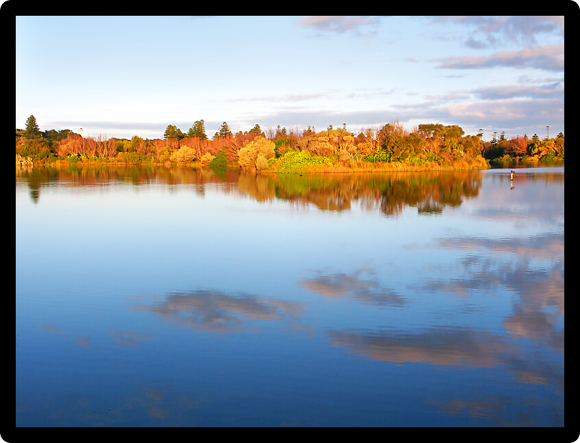 Beautiful blue skies reflect off Lake Pertobe in the town of Warrnambool Australia.